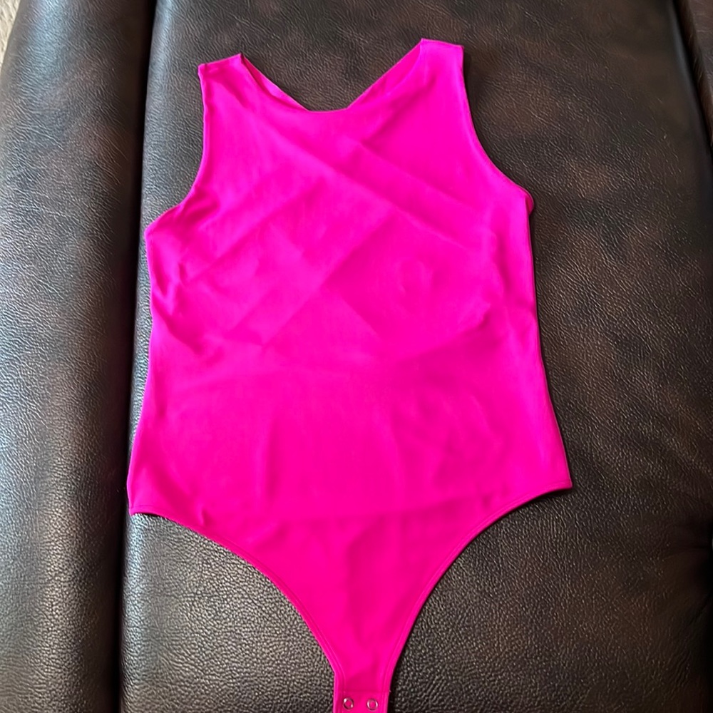 Pink cross back bodysuit